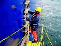 Seaman securing pilot ladder